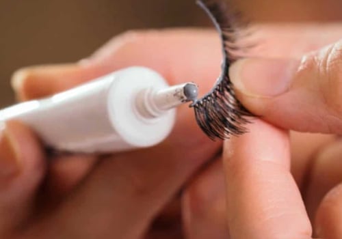 What dissolves lash glue?